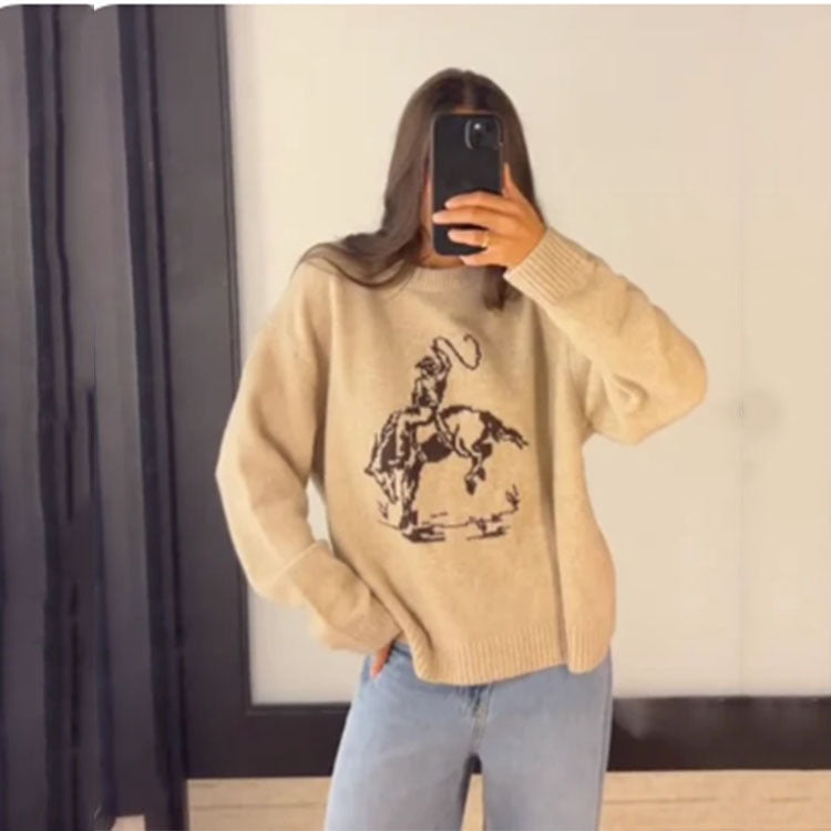Pull ample pour femme à manches longues et col rond – Élégant et tendance.